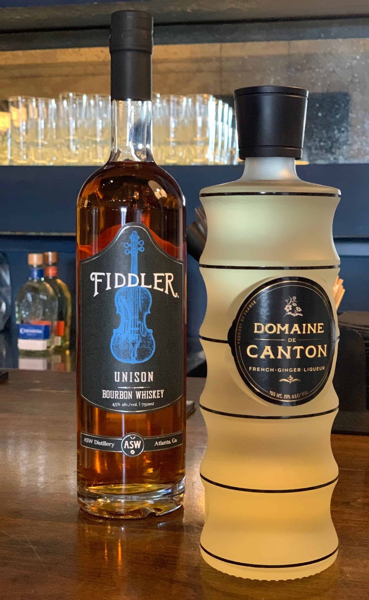 one bottle of fiddlers bourbon whisky and one bottle of domaine de canton ginger liquor